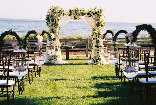 wedding ceremony floral decor photo by Yvette Roman Photography